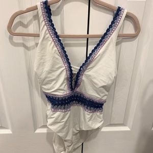 White purple and blue crochet bathing suit.